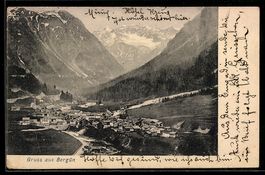 AK Bergün, Ortsansicht mit Kirche und Bergkulisse