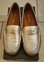 Mocassins Coach cuir couleur or femme état occasion