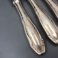 4 Messer versilbert Komet