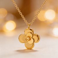 Collier doré trèfle à quatre feuilles