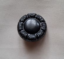 Schwarzer Blumen Knopf. 28 mm.