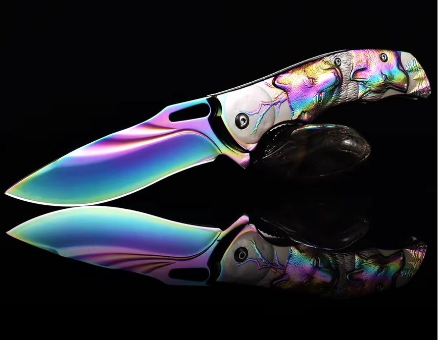 Coltelli tascabile: Klappmesser/Taschenmesser mit Wölfen regenbogenfarben/grau – Nuovo e nell'imballaggio originale da Basel venduto da Seifehuesli 1
