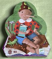 Puzzle Pinocchio Djeco 50 pièces 62x20cm bon état