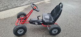 Kart à pédales pour enfants rouge et noir d'occasion