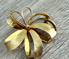 Brosche Gold