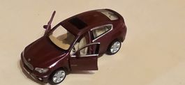 Modellauto BMW X6 Maisto rot Massstab 1:41 gebraucht