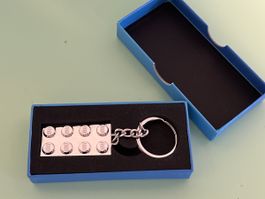 Porte-clé Lego VIP couleur argent neuf 