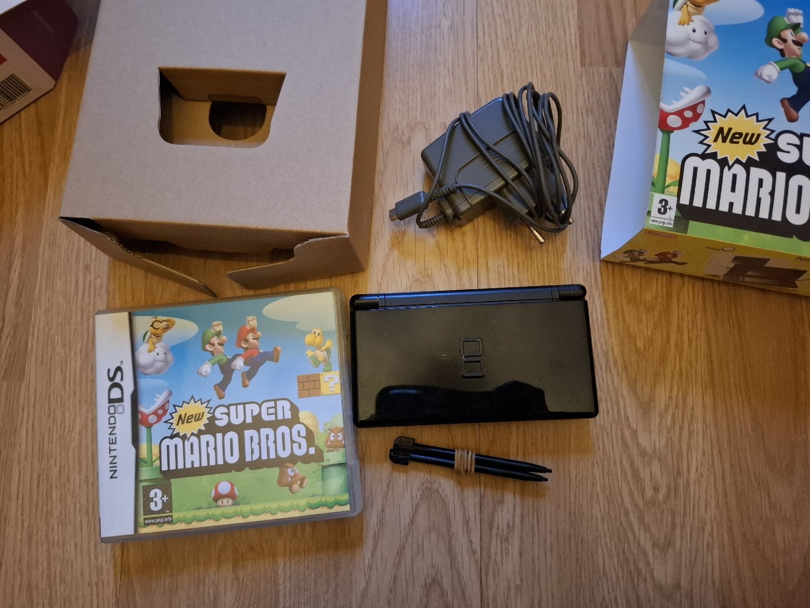 Nintendo Spiele: Nintendo DS lite + New Super Mario Bros – Gebraucht aus Biel/Bienne von st-Pixel 3