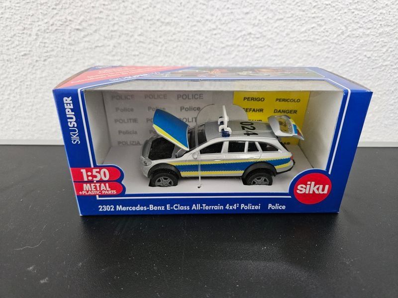 Siku Giocattoli: Neu - Siku - 2302 - Mercedes-Benz E-Class Polizei – Nuovo e nell'imballaggio originale da Dagmersellen venduto da Jarsetz_Restposten