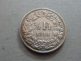 Sammler Stück Silber 1/2 Fr.  1914  -  ungereinigt  .