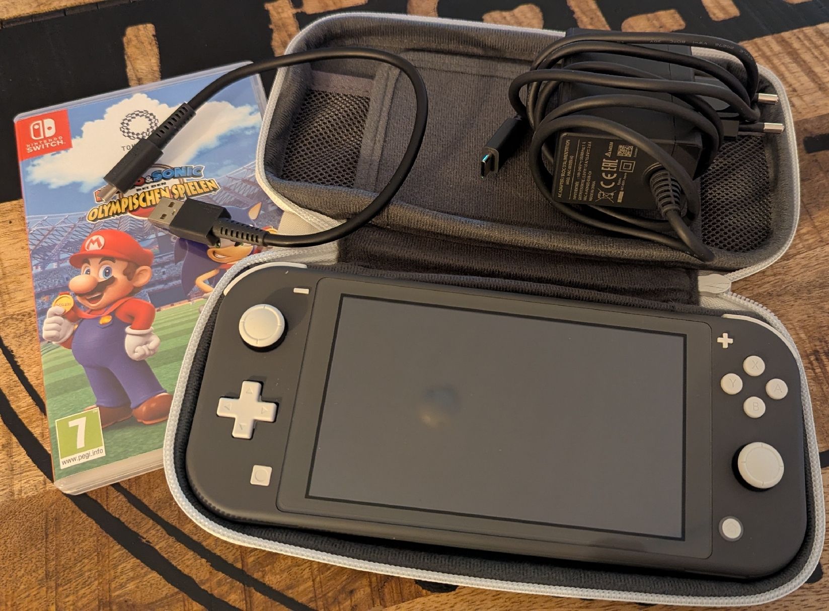 Nintendo Konsolen: Nintendo Switch Lite - grau – Gebraucht aus Langenthal von Stibeline