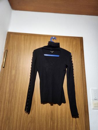 Pull Guess noir col roulé détails manches taille M