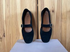 Black suede ballet flats