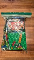 Bag of assorted Lego bricks and baseplates