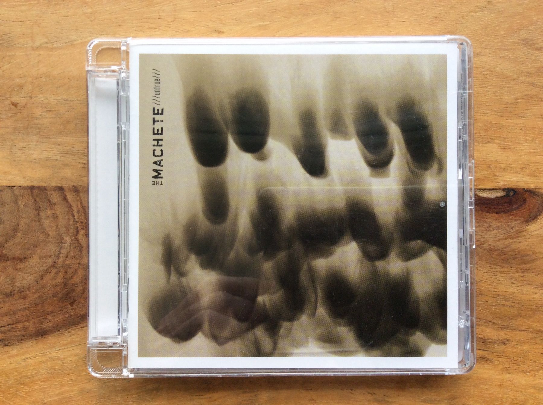 CD: The Machete - Untrue (CD Thrash, Hard Rock) – Usato da Horgen venduto da flyingpenguin2000
