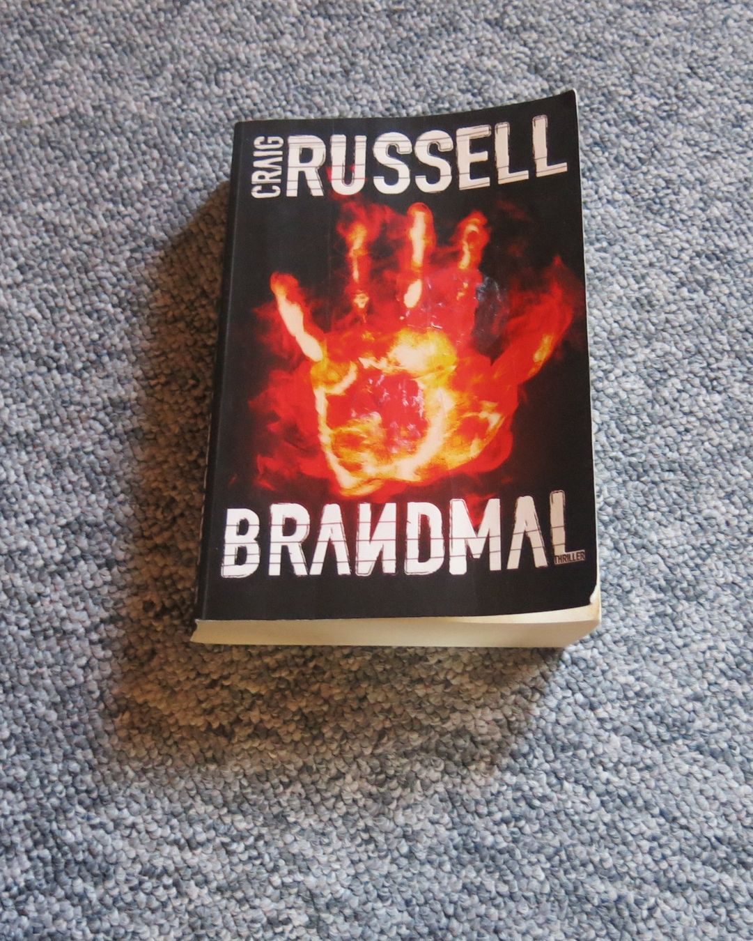 Libri: Russell Craig - Brandmal / Thriller – Usato da Schaffhausen venduto da buecherlaus-thriller