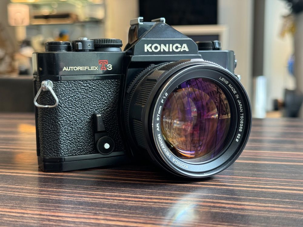 Konica Appareil photo: Konica Autoreflex T3 mit Hexanon AR 57mm 1.2 – D'occasion à Zürich par KochphotoAG 1