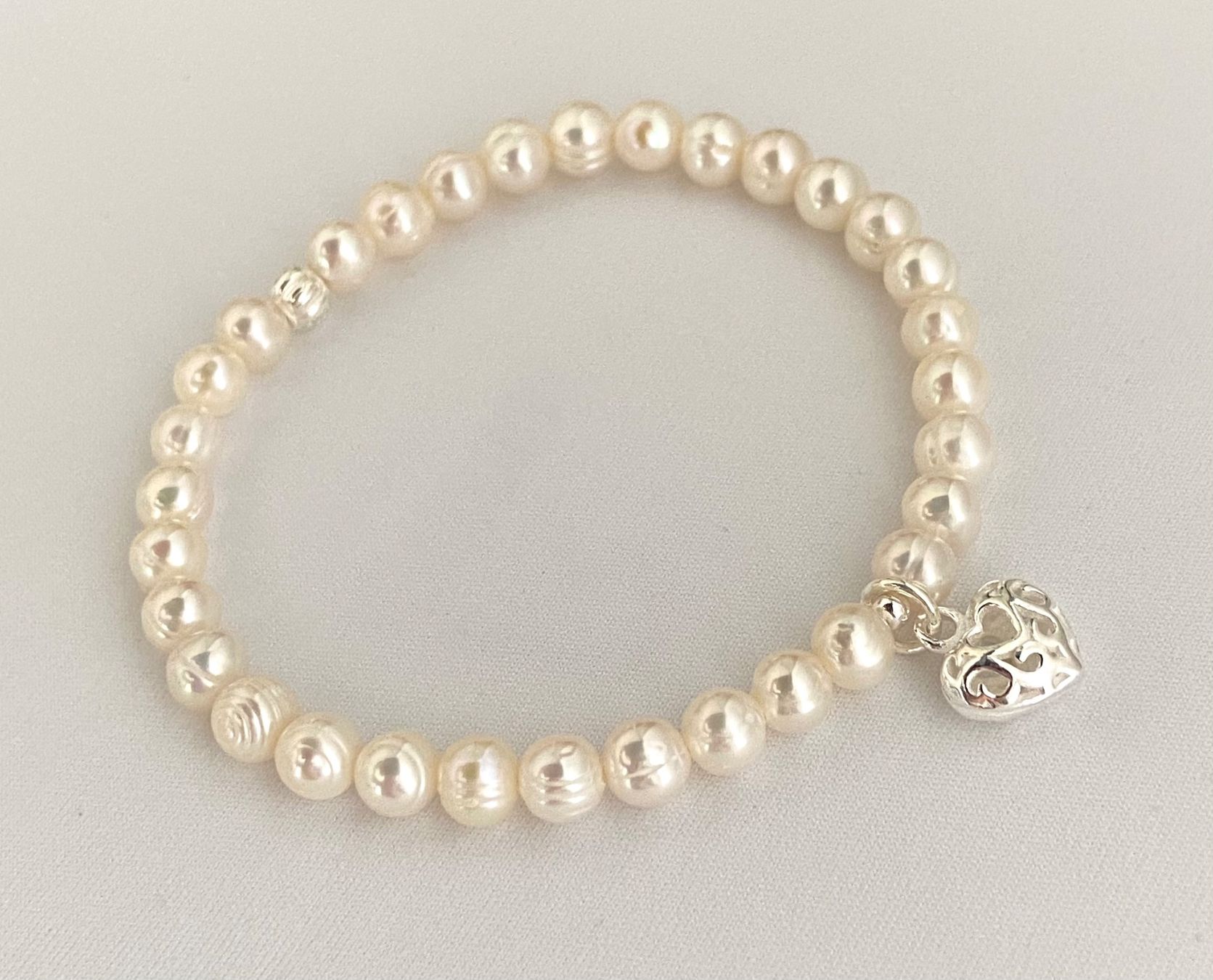 Bracciali & Braccialetti: Armband Süsswasser Perlen mit Silber auf Mass – Nuovo e nell'imballaggio originale da Zuzwil SG venduto da Lemliskat 1