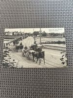Carte postale ancienne: Train militaire en marche!