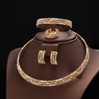 Parure de bijoux dorés, collier, bracelet et boucles!