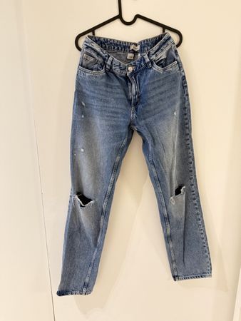 Jean bleu clair troué, taille 36 - look décontracté garanti