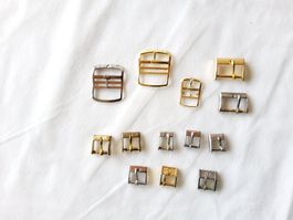 Lot de 13 boucles pour bracelet de montre