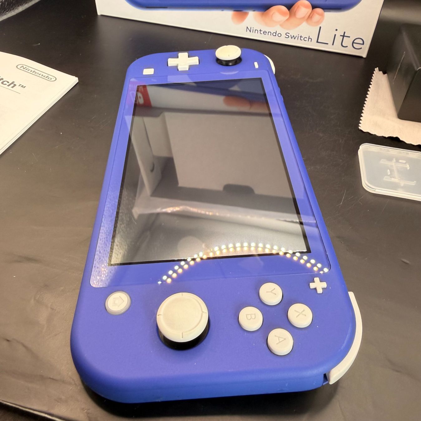 Nintendo Konsolen: Nintendo Switch Lite Blau – Gebraucht aus Düdingen von Nerdworld 9