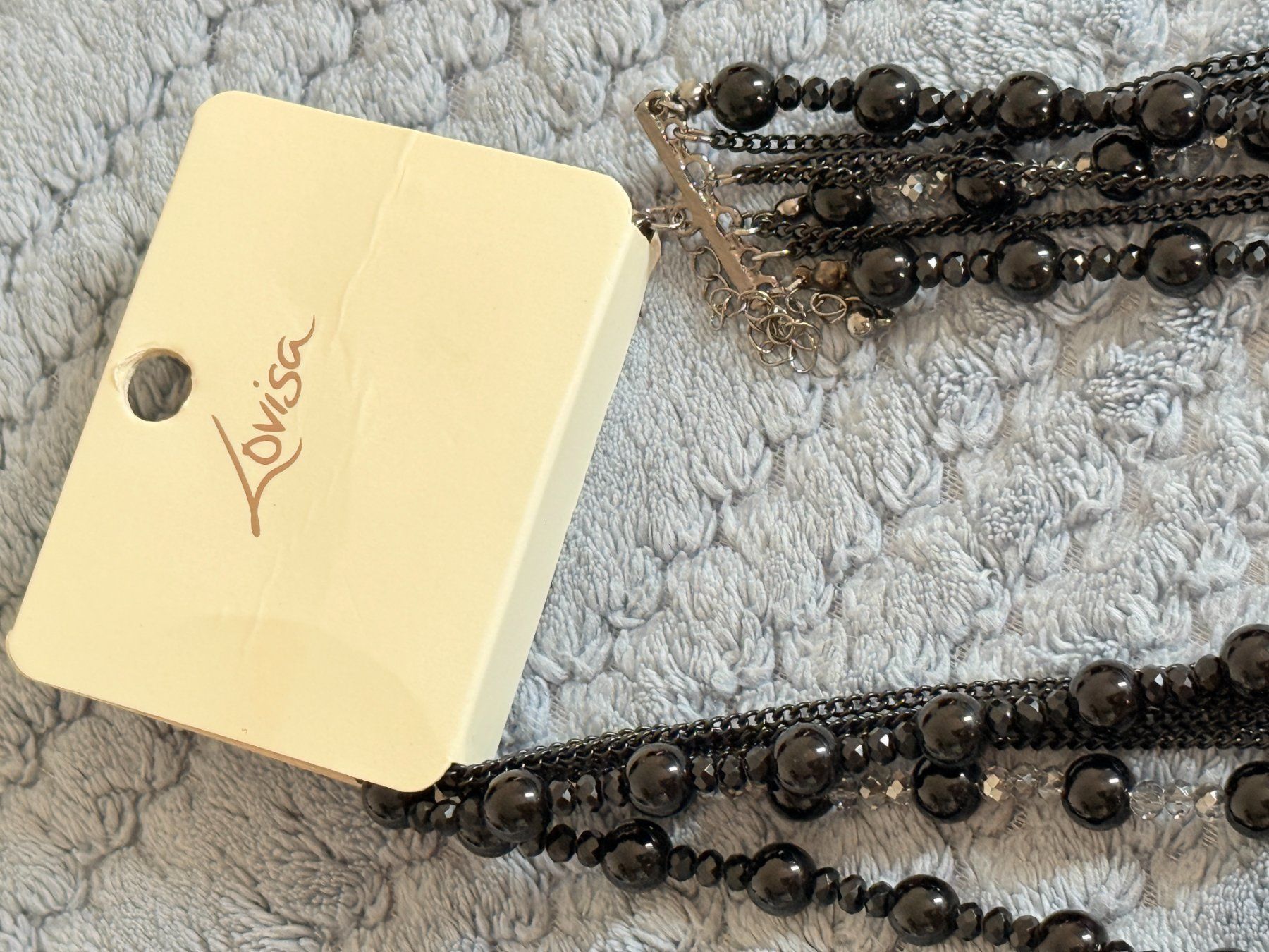 Catenine: Collier multi-rangs noir perles et chaînes Lovisa – Nuovo e nell'imballaggio originale da Genève venduto da AGBERG 2
