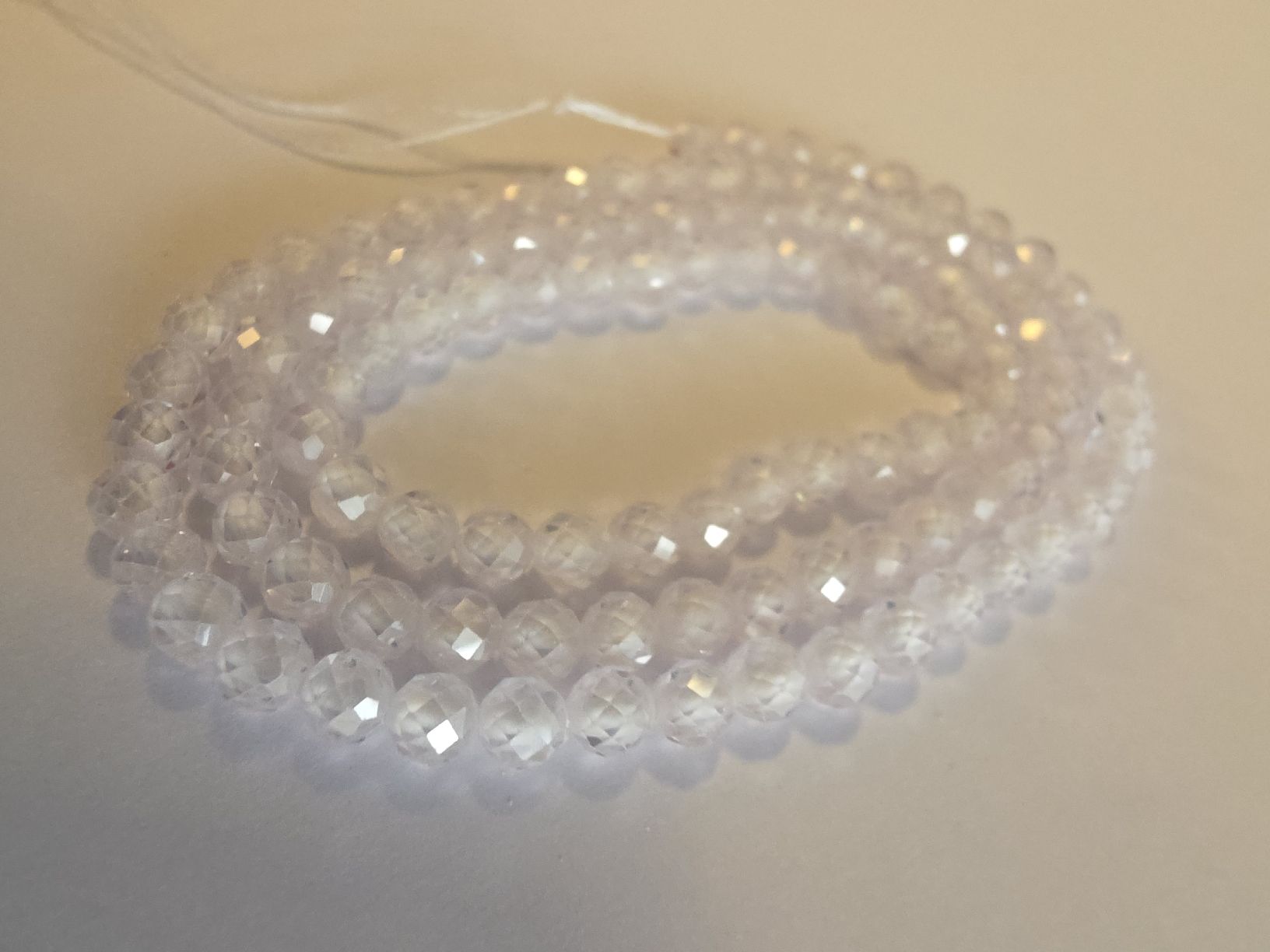 Minerali & Pietre curative: Zirkon Weiss facettiert 3mm. Strang – Nuovo e nell'imballaggio originale da Menziken venduto da Mirager 1