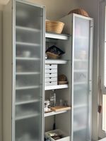 Interlübke shelved cabinet with frosted glass doors