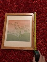 Vintage framed woodblock print of a windswept tree.