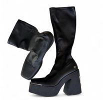 NAKED WOLFE PLATFORM BOOTS