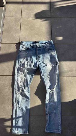 Herren Jeans hellblau mit Rissen Zustand akzeptabel