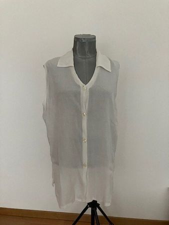 Chemise sans manches blanche taille 42/44