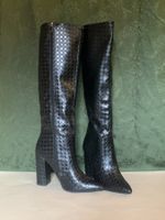 Schwarze kniehohe Stiefel mit Blockabsatz