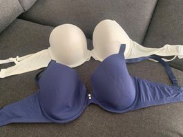 Zwei BHs creme und blau Grösse 75 D American Eagle