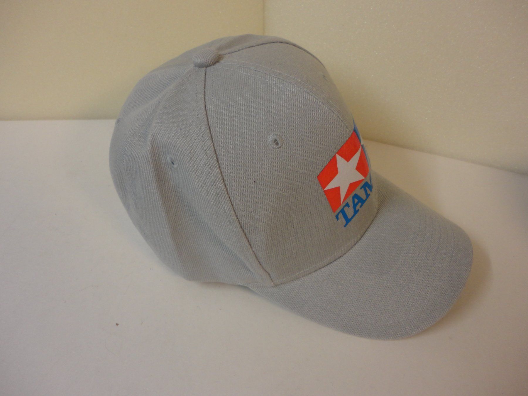 Modellismo RC: Tamiya Cap, grau, neu. Ideale Kopfbedeckung! – Nuovo e nell'imballaggio originale da Horgen venduto da RcModell 1