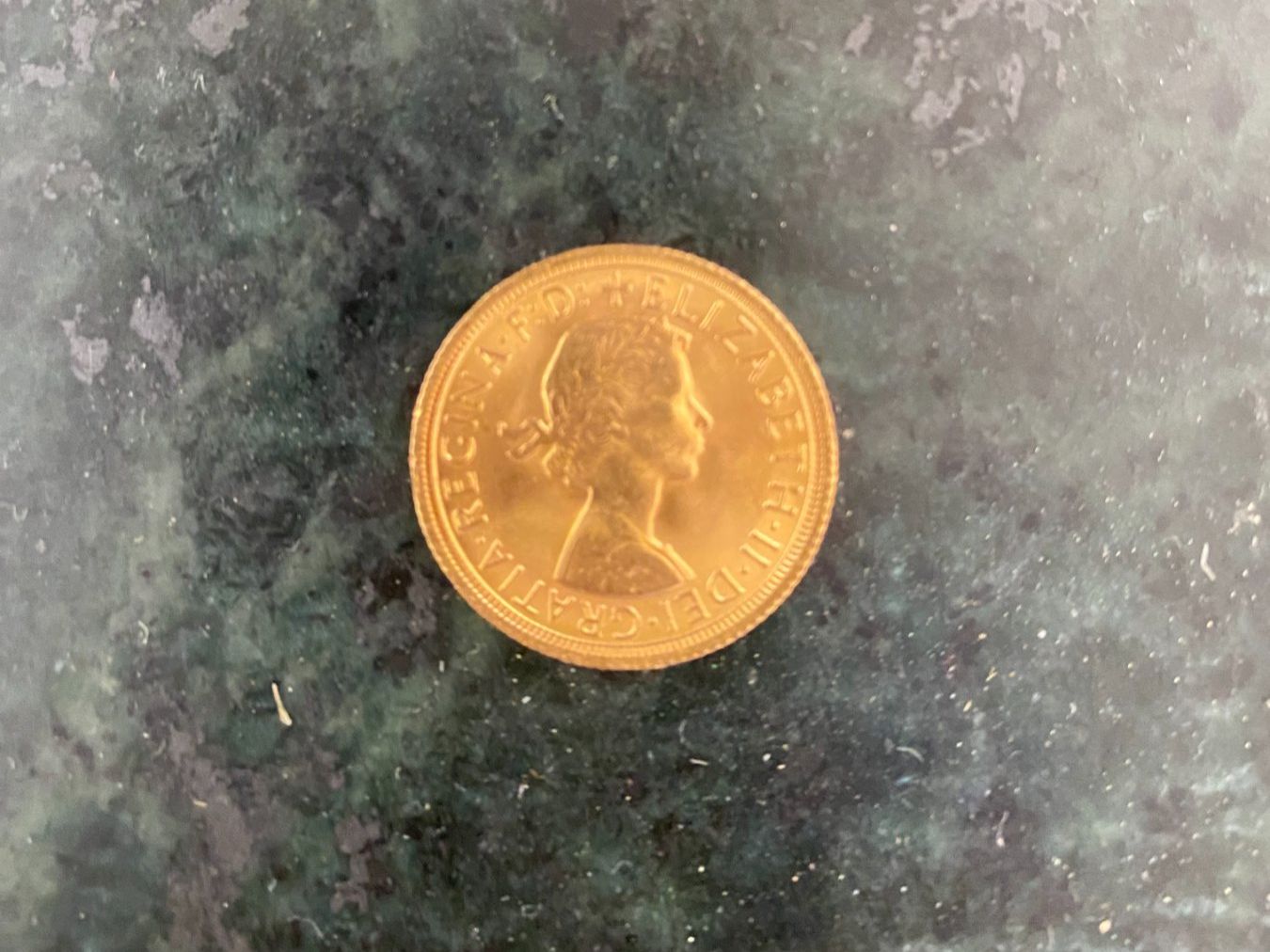 Alle Münzen: Goldmünze Sovereign 1965 – Gebraucht aus St. Gallen von Blin 2