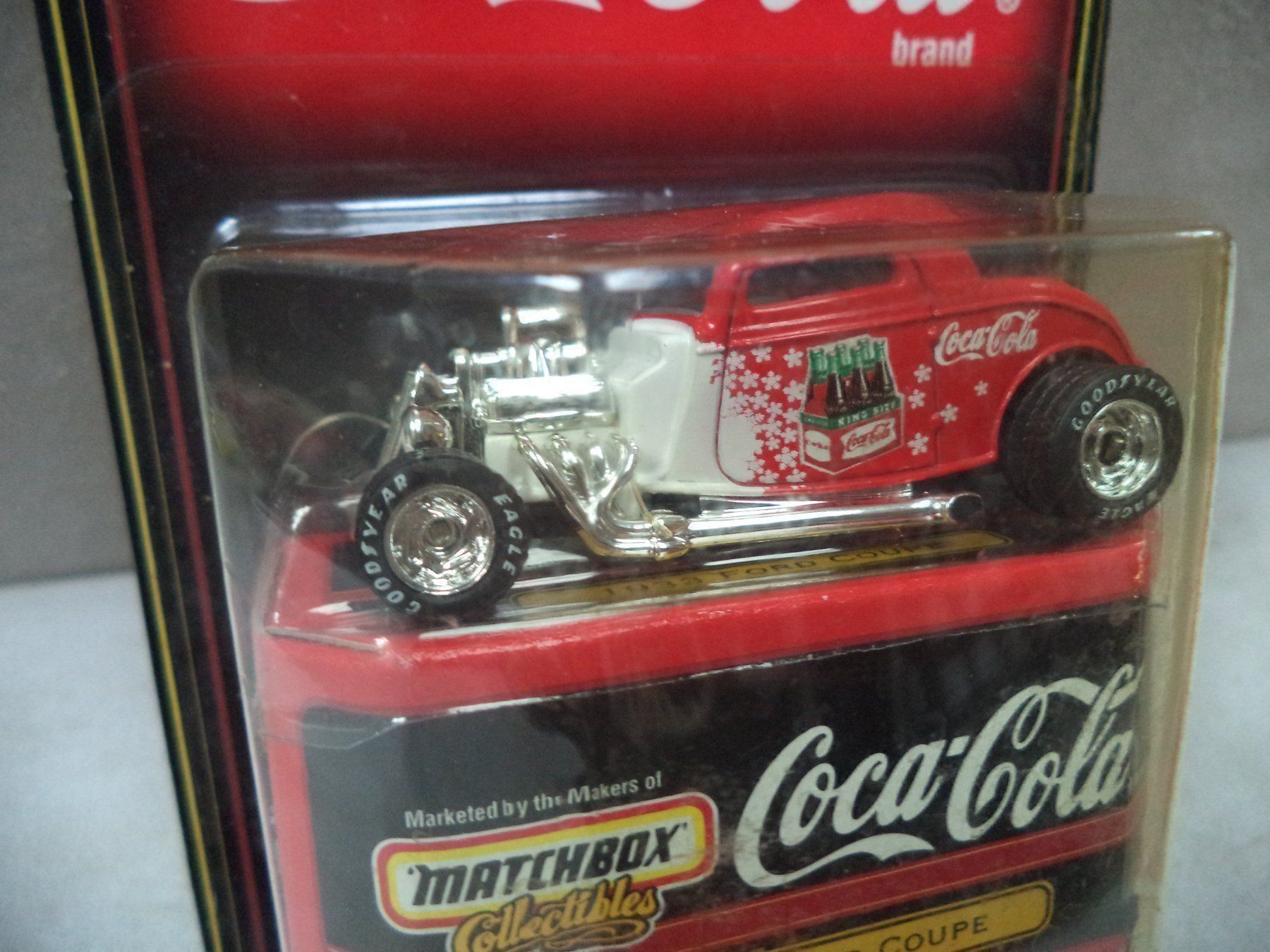 Modellini d'auto: MATCHBOX Coca Cola 1933 Ford Coupe – Nuovo e nell'imballaggio originale da Rieden AG venduto da Wirth03 1