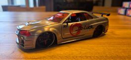 Modellauto Nissan Skyline R34 Dr-Luck silber 1/24