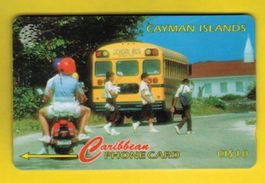 Telefonkarte Cayman Islands. Scool Bus, Motorrad
