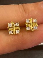 Clous d’oreilles bicolores plaqués or et petits zircons