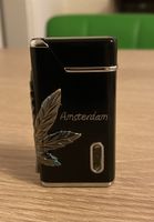Elegantes Sturmfeuerzeug mit Cannabisblatt-Design