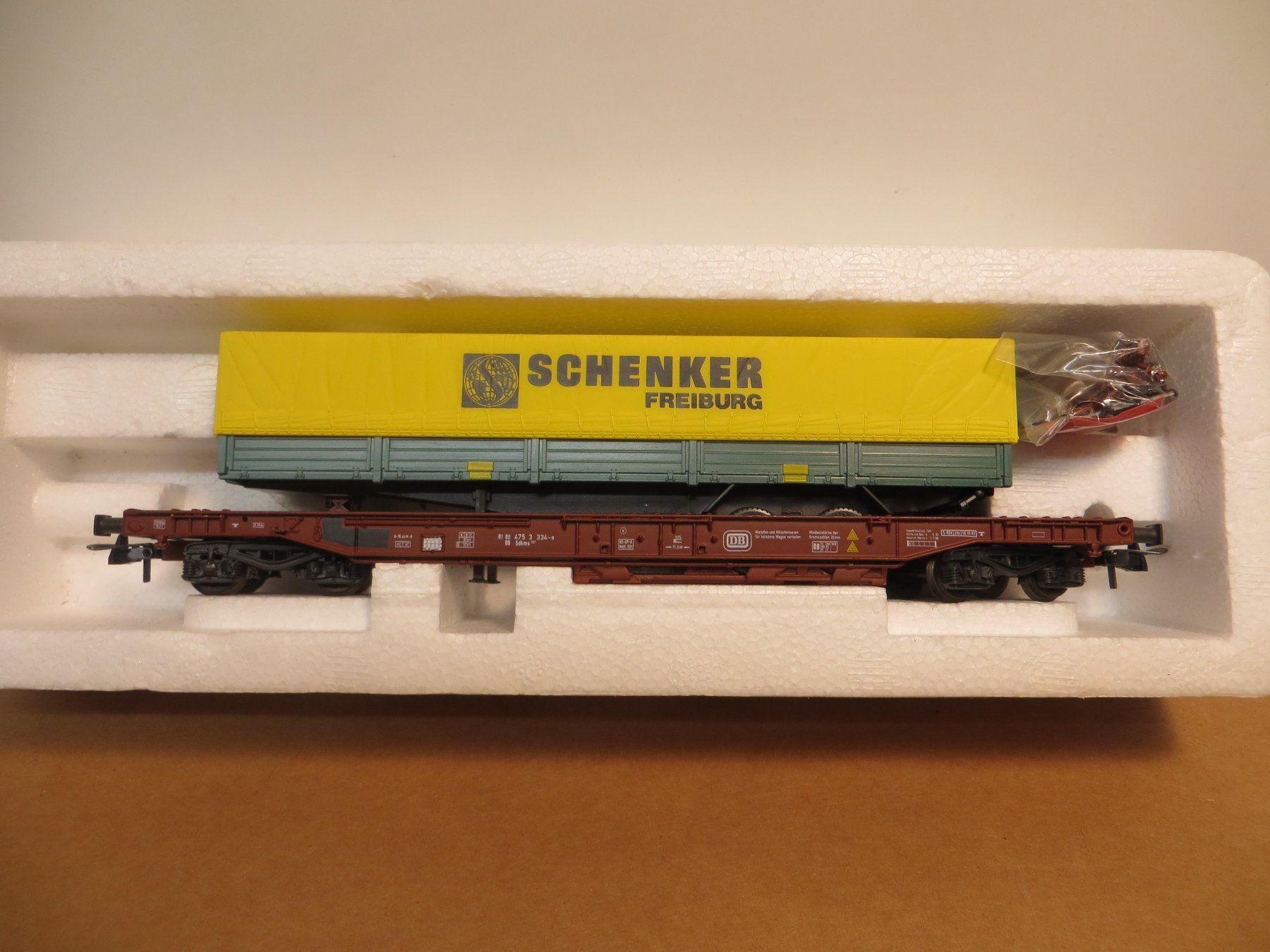 Roco Modelleisenbahnen: Roco Taschenwagen Schenker – Neu (gemäss Beschreibung) aus Lausen von  1