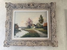 Charmante peinture de paysage avec cadre décoratif.