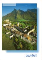 AK Gruyères: Ville et château avec les remparts