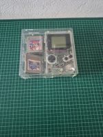 Nintendo Game Boy transparent with 3 games and case in ovp