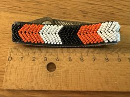 Armband Leder Schwarz Orange Weiss Perlen Tribal Muster