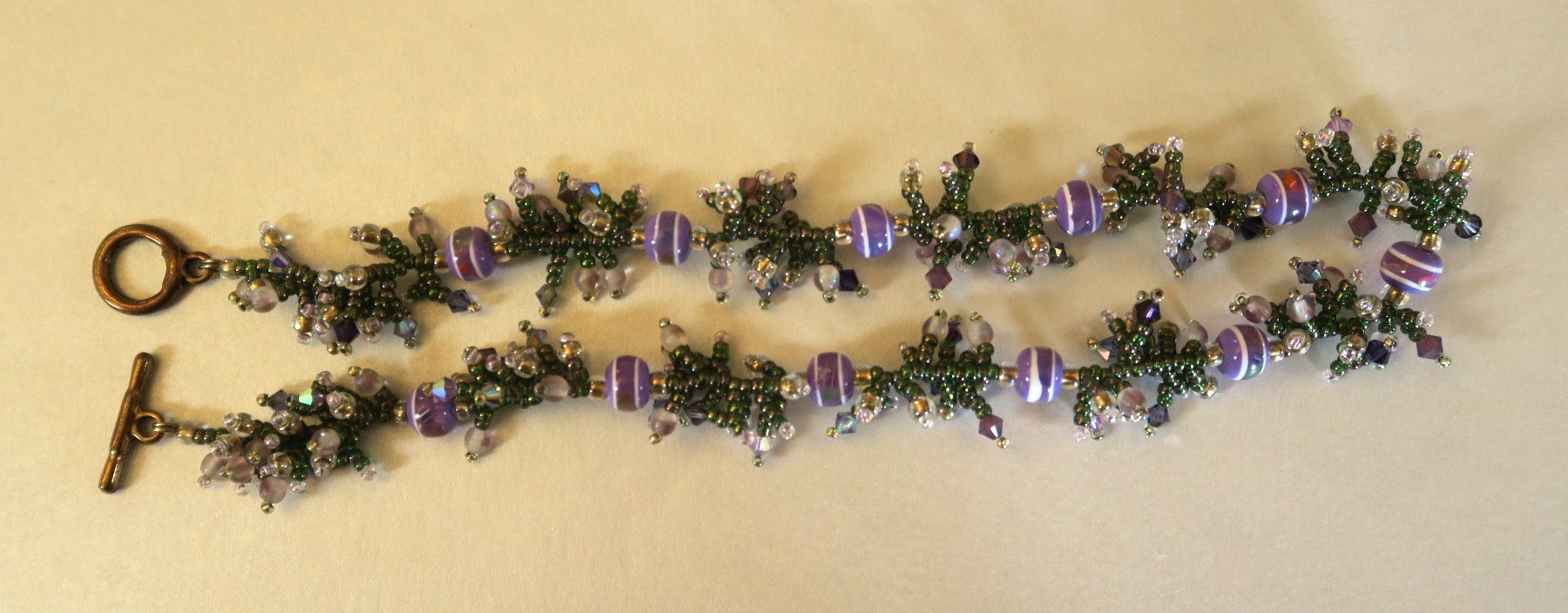 Catenine: Kette Glasperlen violett/grün – Usato da Brittnau venduto da marlenestone