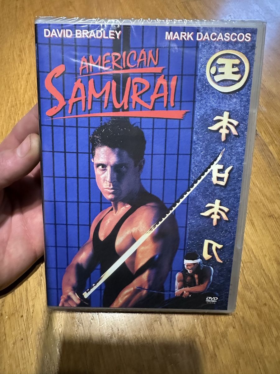 Tutti i DVDs: American Samurai, DVD, OVP, Uncut ￼ – Nuovo e nell'imballaggio originale da Benken ZH venduto da Audi-erich